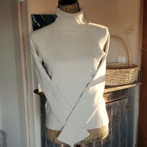 NWOT Maurice's size large creamy tan turtleneck.
